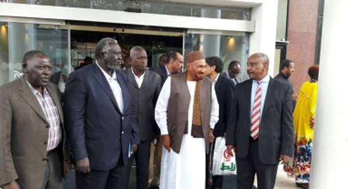 NUP leader Sadiq al-Mahdi (C) speaks with SPLM-N leader Malik Agar and its Secretary General Yasir Arman following the signing of the Roadmap Agreement in Addis Ababa on 8 August 2016 (ST photo)
