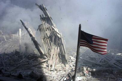 An American flag flies near the base of the destroyed World TradeCenter in New York on September 11, 2001 (Reuters/ file photo)