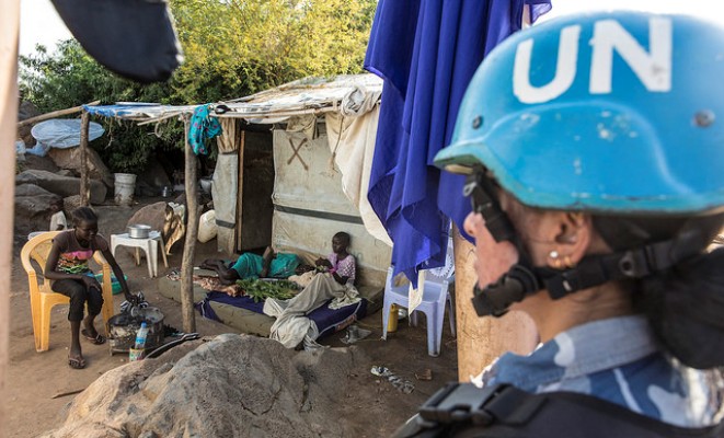 UN peacekeeper keeps watch inside a Protection of Civilians sites, in Juba as a UN Security Council delegation meets with the IDPs on 3 September 2016 (UNMISS Photo)