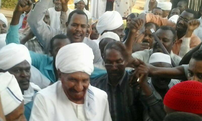 Sadiq al-Mahdi greets his supporters after his release from prison on 15 June 2014 (ST Photo)
