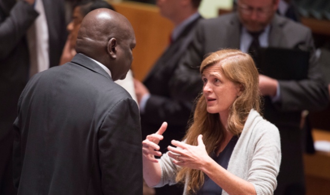 Samantha Power, U.S. Ambassador to the UN, speaking with Akuei Bona Malwal, UN's S. Sudanese envoy to the UN, at the Security Council meeting on 13 July 2016 (UN Photo)