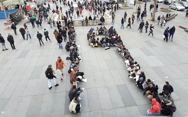 On Sunday 18, 2016, Sudanese activists form a '19' at Place de la Répubique in Paris to show their solidarity with calls for general strike on 19 Dec 2016 (ST/Gaffar Mahmoud Photo)