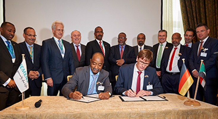 STPGC's Planning and Projects General Director Mohamed Osman Mahgoub Osman, and Siemens Vice President Sales Africa Marcus Nelle sign the contract in Berlin on 1 December 2016 (Siemens Photo)