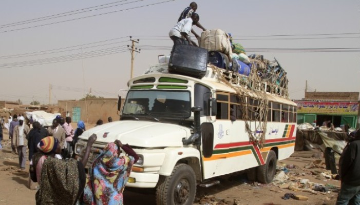 South Sudanese pack their belongings on a bus before their trip back to the South in Khartoum (Ashraf ShazlyAFP/Getty/ Image file Photo)