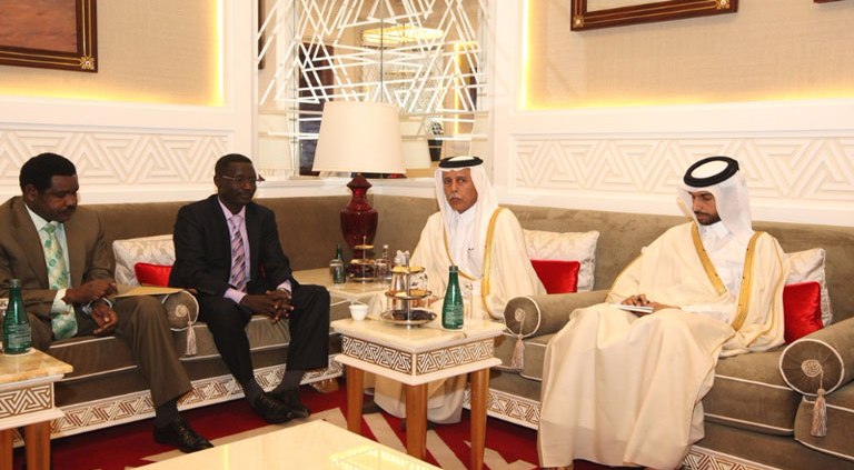 Qatari Deputy Prime Minister Ahmed bin Abdullah Al-Mahmoud (S-R) meets Abul Gasim Imam (SL) after the signing of the peace agreement on 23 January 2017 (QNA)