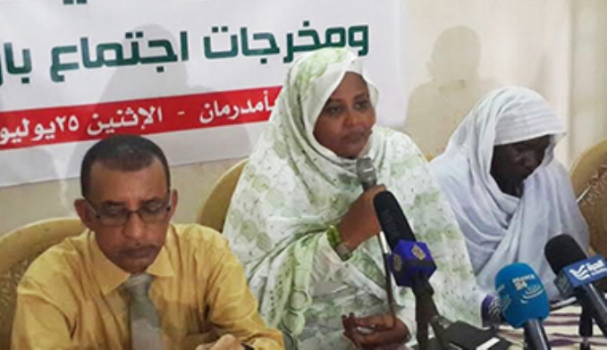 SCoP leader Omer al-Digair and NUP deputy chairman Merriam al-Mahdi speak in a press conference in Khartoum on 25 July 2016 (ST Photo)