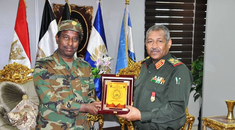 General Staff, Lt. Gen. Emad al-Din Mustafa Adawi poses poses for a picture with the Ethiopia’s National Defence Forces Chief of Operations Lieu. Gen. Abraham Woldemariam in Khartoum on 28 March 2017 (ST Photo)