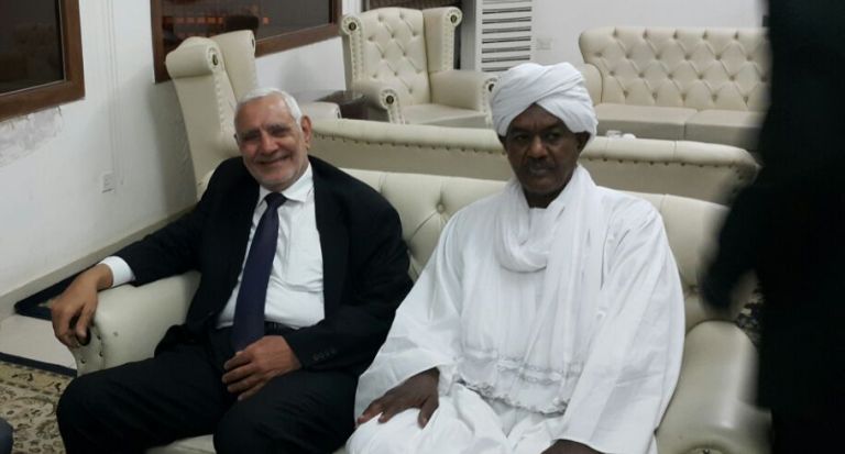 Abdel-Moneim Aboul-Fotouh (L) received by PCP figure Bashir Adam Rahama at Khartoum airport on 23 March 2017 (ST Photo)