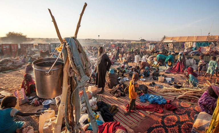 Thousands of people, mostly women and children, take refuge at a safe zone adjacent to UNAMID's base in Um Baru, North Darfur, on 27 January 2015 (UNAMID Photo)