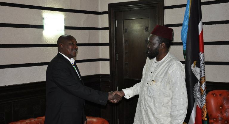 President Salva Kiir shakes hands with Governor Louis Lobong at the presidential palace on Wednesday 28 June 2017 (ST Photo)