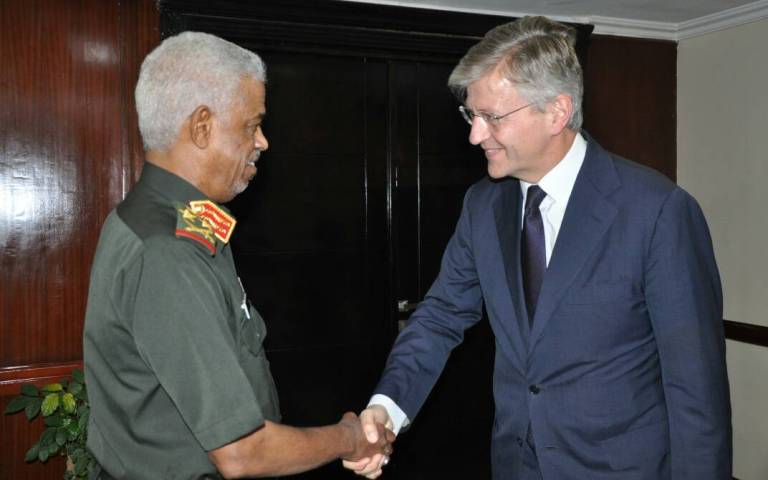 Defence Minister Awad Ibn Ouf shakes hands  with the head of UN DPKO Jean-Pierre Lacroix on 19 July 2017 (ST Photo)