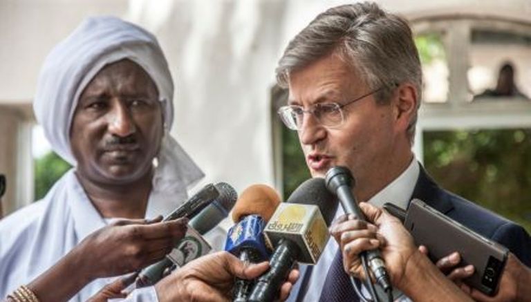 Head of UN peacekeeping operationsJean Pierre Lacroix speaks to reporters following a meeting with N. Darfur governor (L)in El-Fasher on 21 July 2017 (UNMAID photo)