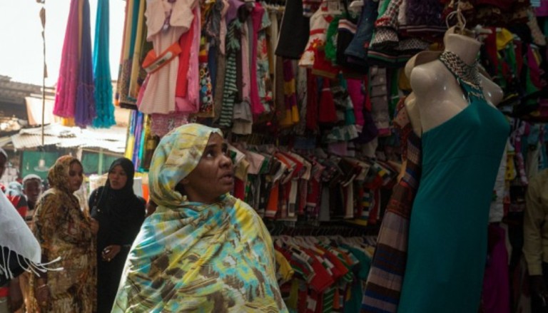 Sudanese women shop at a clothing and textile market in Khartoum in March 2013 - (Ilya Varlamov Photo)