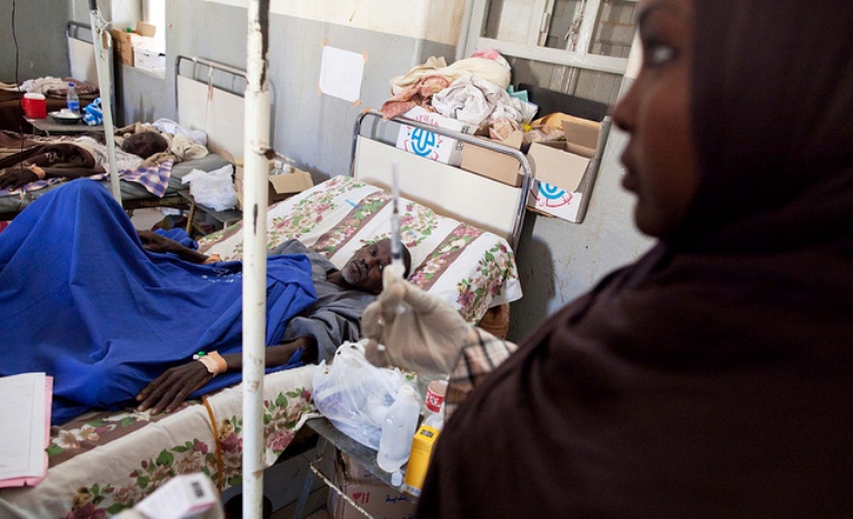 A nurse is medicating a patient at the intensive-care area of the El Fasher Hospital, North Darfur on 8 Dec 2012 (UNAMID Photo)