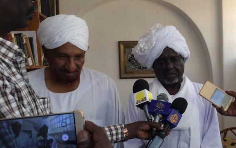 PCP SG Ali al-Haj (R) speaks to the media with NUP leader Sadiq al-Mahdi after a joint meeting in Khartoum on 4 September 2017 (ST Photo)