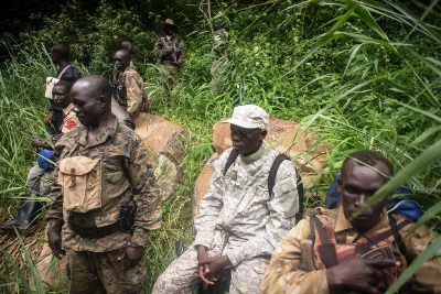 Martin Abucha (second from right) rests with his troops in rebel-held South Sudan (Jason Patinkin)