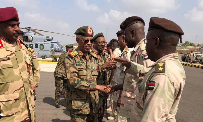 Defence Minister Awad Ibn Ouf greets Sudanese troops stationed in Saudi Arabia on 29 Nov 2017 (ST photo)