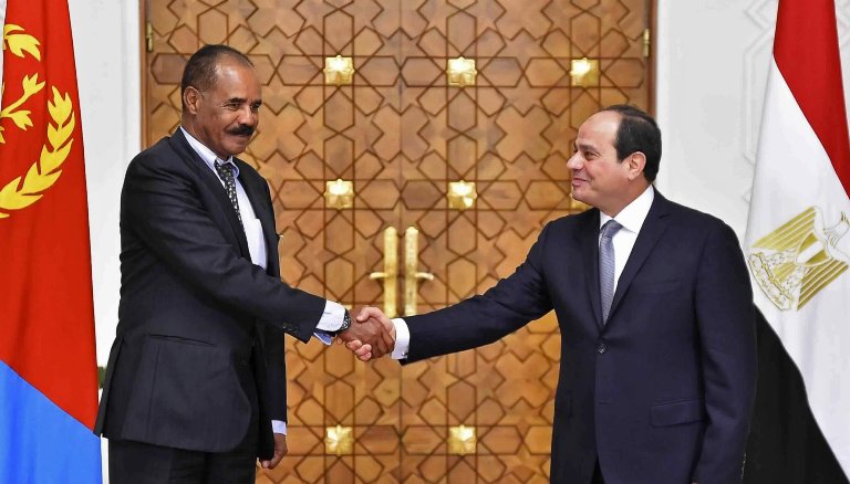 Eritrean President Isaias Afwerki, left, shakes hands with Egyptian President Abdel-Fatah al-Sisi at the presidential palace, in Cairo, Egypt, Tuesday, Jan. 9, 2018. (AP Photo)