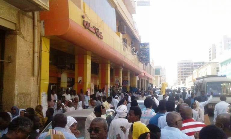 Demonstrators in Khartoum downtown march to protest against the Sudanese government's subsidies cuts and austerity measures on 16 January 2018 (ST Photo)