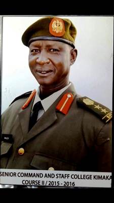 Deceased military officer Colonel John Malou (File)