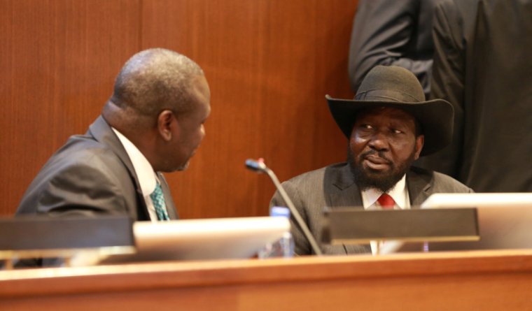 Kiir (R) speaks with Machar during the signing ceremony of the revitalized peace agreement on 12 September 2018 (UNMISS Photo)