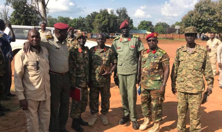 Lam Paul  Gabriel SPLA-IO Spokesperson (2R) pose with some participant at the end of a meeting at the SSPDF headquarters in Yei on 8 November 2018 (Photo SPLA-IO)