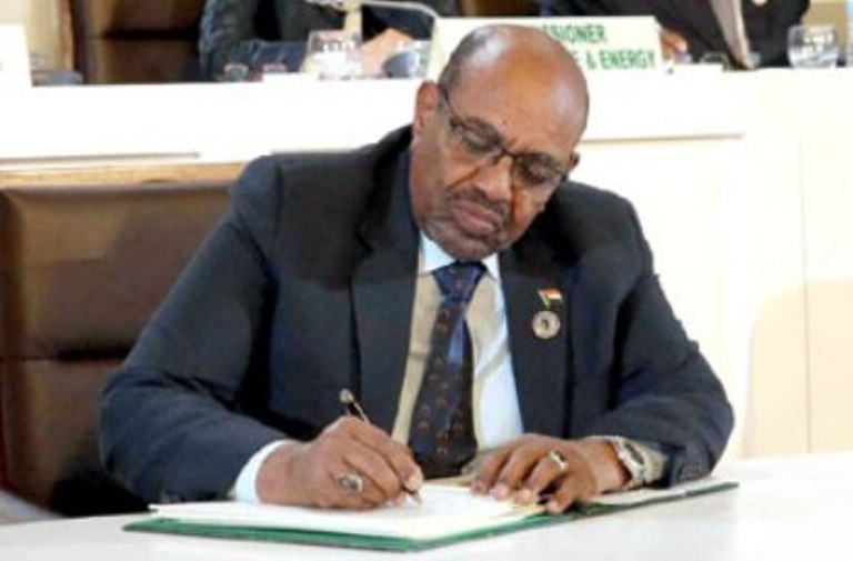 Sudanese President Omer al-Bashir, signs the African Continental Free Trade Area agreement in Kigali, Rwanda, on March 21, 2018