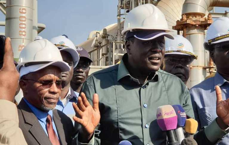 Minister Ezekiel Lol Gatkuoth, flanked by his Sudanese counterpart speak to reporters during a ceremony of the resumption of Oil Production in Unity Oilfields on 21 Jan 2019 (ST photo)