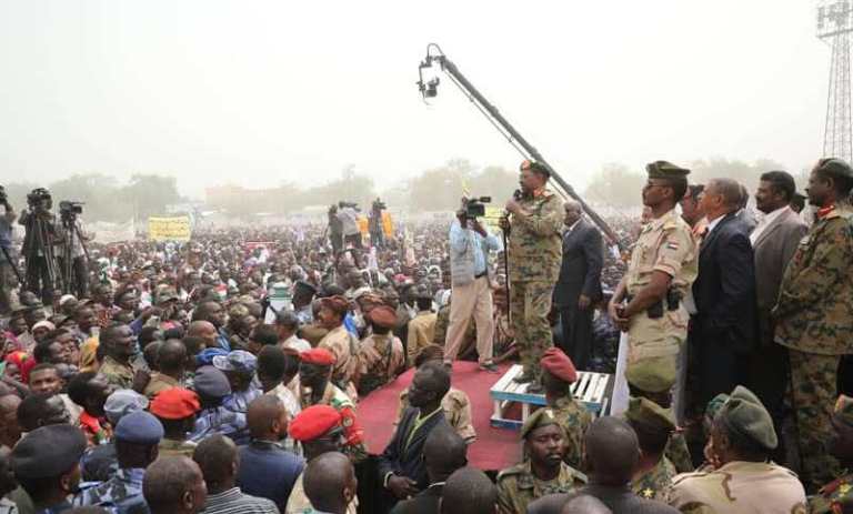 Omer al-Bashir speaks to the crowd in Kaduglei on 28 January 2019 (ST Photo)