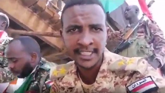 Rebellious military officer speaks to protesters outside the headquarters of the Sudanese army in Khartoum on 9 April 2019 (ST Photo)
