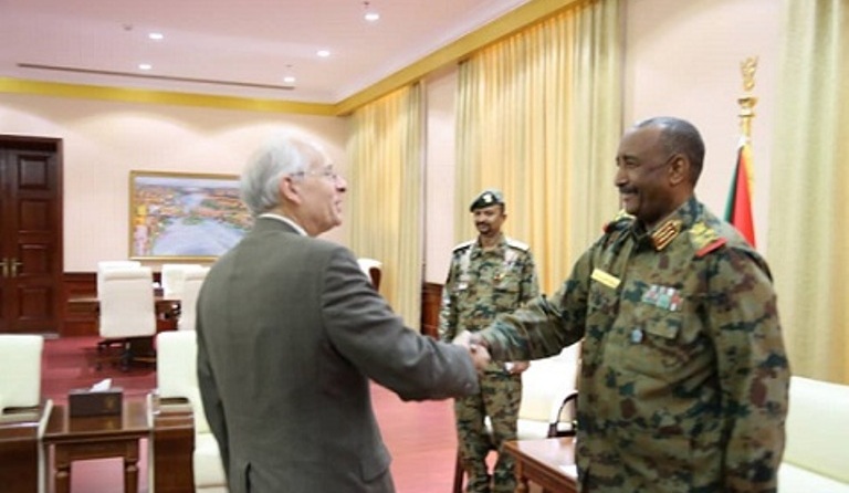 TMC head Abdel Fattah al-Burhan shakes hands with US envoy to Sudan Donald Booth on 15 July 2019 (ST photo)