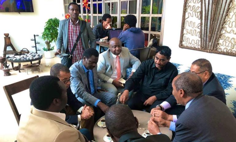 Some FFC leader discuss with SRF members during a break outside the meeting room in Addis Ababa on 23 July 2019 (ST Photo)