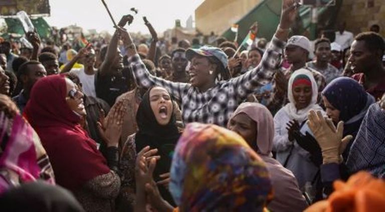 Sudanese celebrate the collapse of al-Bashir's regime on 11 April 2019 (Photo Getty Images).jpg