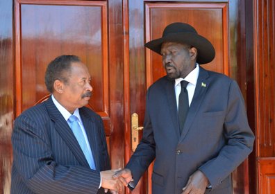 Sudan's Abdallah Hamdok shaking hands with South Sudan's Salva Kiir before to leave Juba back to Khartoum on 13 Sept 2019 (SSPPU photo)