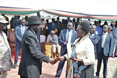 South Sudan's Salva Kiir greets Rebecca Nyandeng Garang during the 64th Veterans Day celebrations in Juba, September 5, 2019 (PPU)