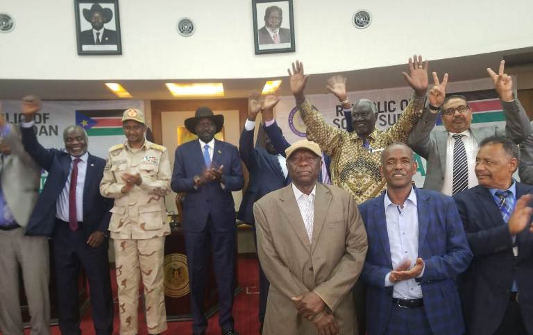 President Kiir and Sudanese parties applauding after the signing of a plan for peace in Sudan in Juba on 11 September 2019 (ST photo)