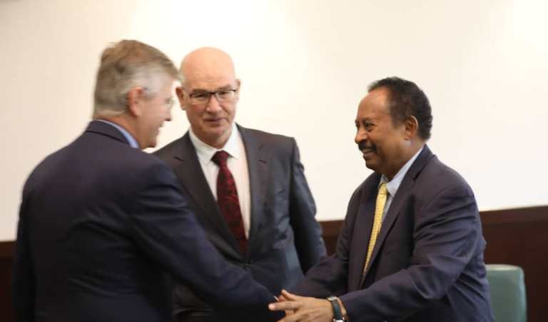 amdok_shake_greets_un_and_au_officials_in_khartoum_on_9_october_2019.jpg