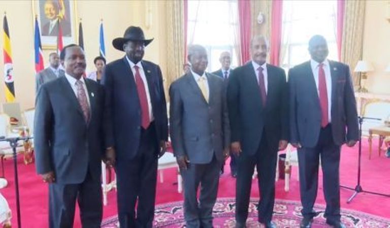 President Museveni surrounded by President Salva Kiir (L) and Sudan's Abdel Fattah al-Burhan (R) while SPLM-IO (R) and Kenya's Kalonzo Musyoka (L) in Kampala on 7 November 2019 (ST photo)