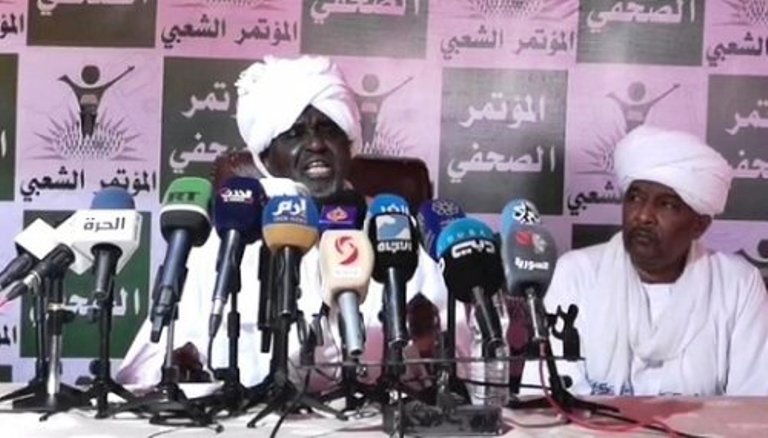 Ali al-Haj speaks in a press conference to announce his support to al-Bashir handover to the ICC on 11 Nov 2019 (ST photo)