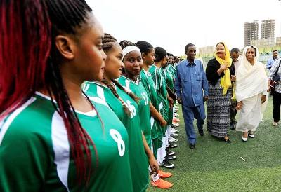 Sudan's member of sovereign council Aisha Musa and Sudan's Minister for Youth and Sports Wala'a Essam al-Boushi greet players before Sudan's first women's league soccer match at the Khartoum stadium, Khartoum, Sudan September 30, 2019 (REUTERS).