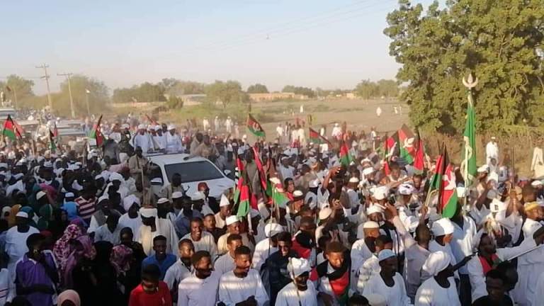 Al-Hamdi  (on the first vehicle)  welcomed by his supporters in the While Nile state after his arrival on 6 Dec 2019 (ST photo)