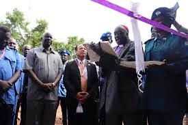 Minister of Interior and Japanese ambassador at the handover ceremony of new building to DCRNPI (IOM courtesy photo)