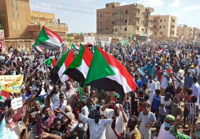 Sudanese anti coup protesters attend a gathering in the capital Khartoums twin city of Omdurman on 30 October 2021 AFP photo.
