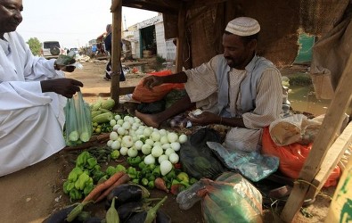 a_vendor_sells_vegetables_during_ramadan_at_a_local_market_in_north_khartoum_august_3_2012_-_reuters.jpg