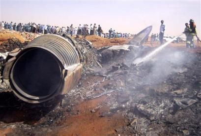 firefighters_hose_down_the_wreckage_of_a_sudanese_ilyushin_plane_at_the_crash_site_about_25_kilometers_16_miles_from_the_center_of_khartoum_sudan_thursday_feb_3_2005.jpg