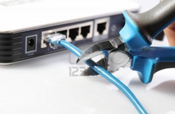 hand-cutting-internet-cable-of-router.jpg