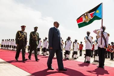president_al-bashir_inspects_a_guard_of_honour_after_arriving_at_juba_airport.jpg