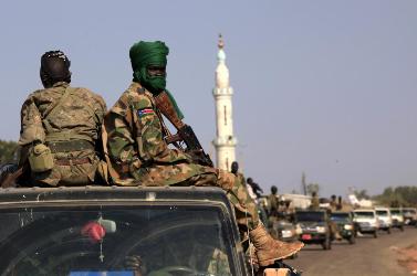 spla_soldiers_sit_at_the_back_of_a_pick-up_truck_in_bentiu_unity_state_january_12_2014._reuters_andreea_campeanu.jpg