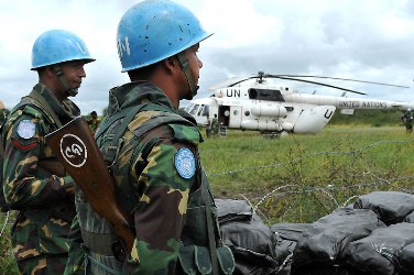 un_peacekeepers_in_south_sudan_with_one_of_their_helicopters_unmiss_.jpg