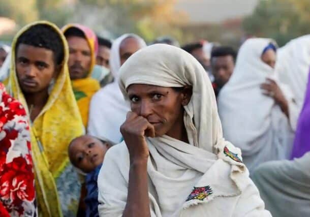 A woman queues to receive food assistance in the Tigrayan town of Shire last year. Photo Reuters